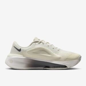 Nike Versair 
Color: Coconut Milk/Sail/Gum Light Brown/Iron Grey women size 9.5